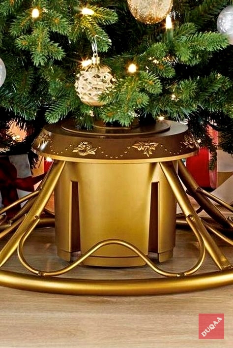 Duqaa’s gold color Christmas tree stand offers a secure and elegant base for your holiday tree, adding a luxurious touch to your Christmas decor with its stunning gold finish.